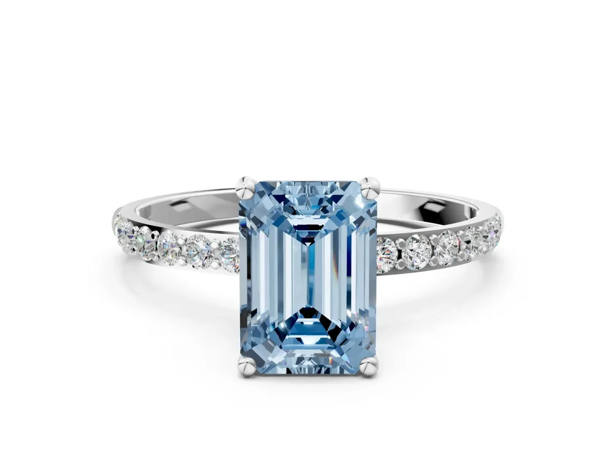 Fancy Blue Emerald Cut Diamond Solitaire Ring with Round Pavé Shoulders and Prong Setting Silver