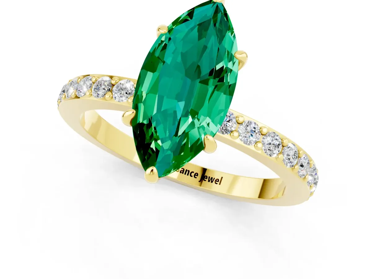 Marquise Cut Emerald Solitaire Engagement Ring with Pavé Band and Four-Prong Setting Yellow gold