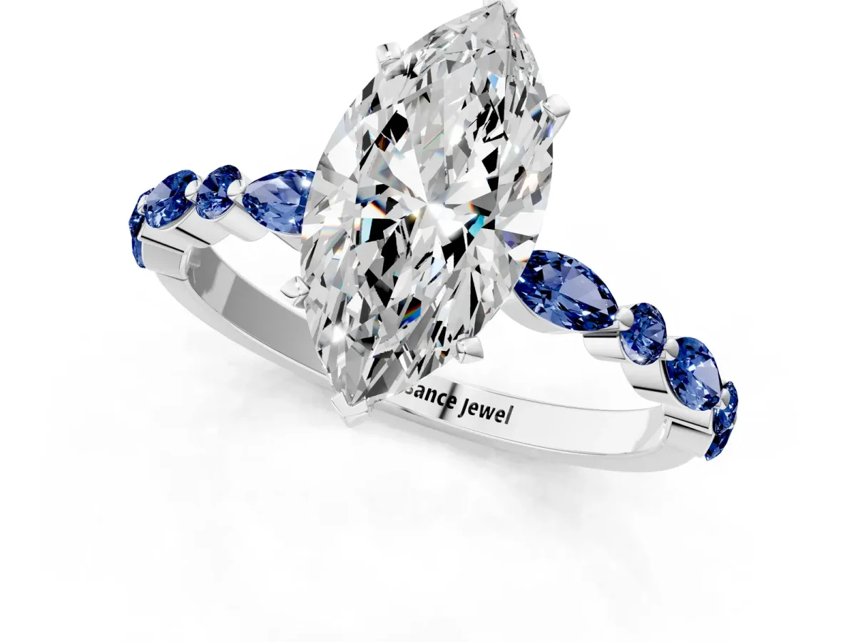 Marquise Cut Diamond Ring with Marquise and Round Blue Sapphire Side Stones and Four-Prong Setting Platinum