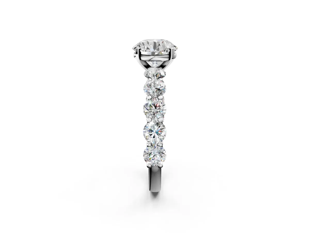 Round Cut Diamond Prong Setting with Side Stones on a Pave Band White gold