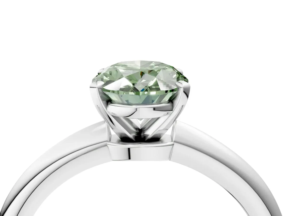 Fancy Green Oval Cut Diamond Solitaire Ring with Six-Prong Setting and Classic Band Platinum