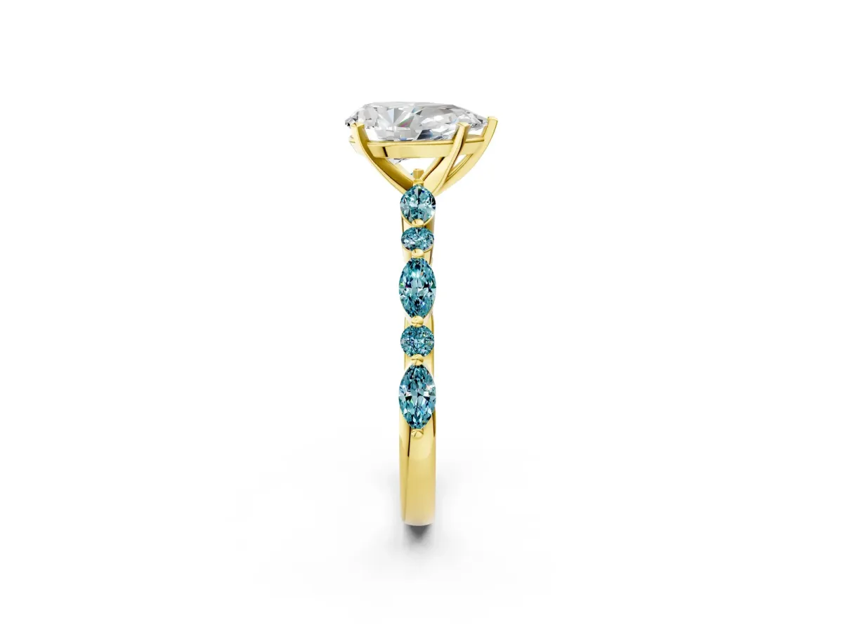 Pear Cut Diamond Ring with Marquise and Round Blue Topaz Side Stones and Four-Prong Setting Yellow gold