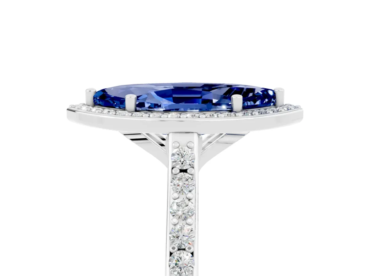 Marquise Cut Blue Sapphire Halo Engagement Ring with Round Pavé Shoulders and Prong Setting Platinum