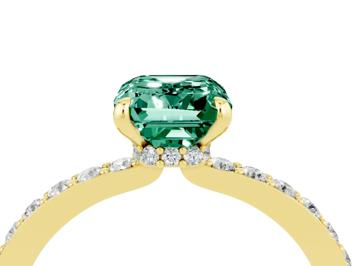 Emerald Cut Green Sapphire Solitaire Engagement Ring with Pavé Band and Four-Prong Setting Yellow gold