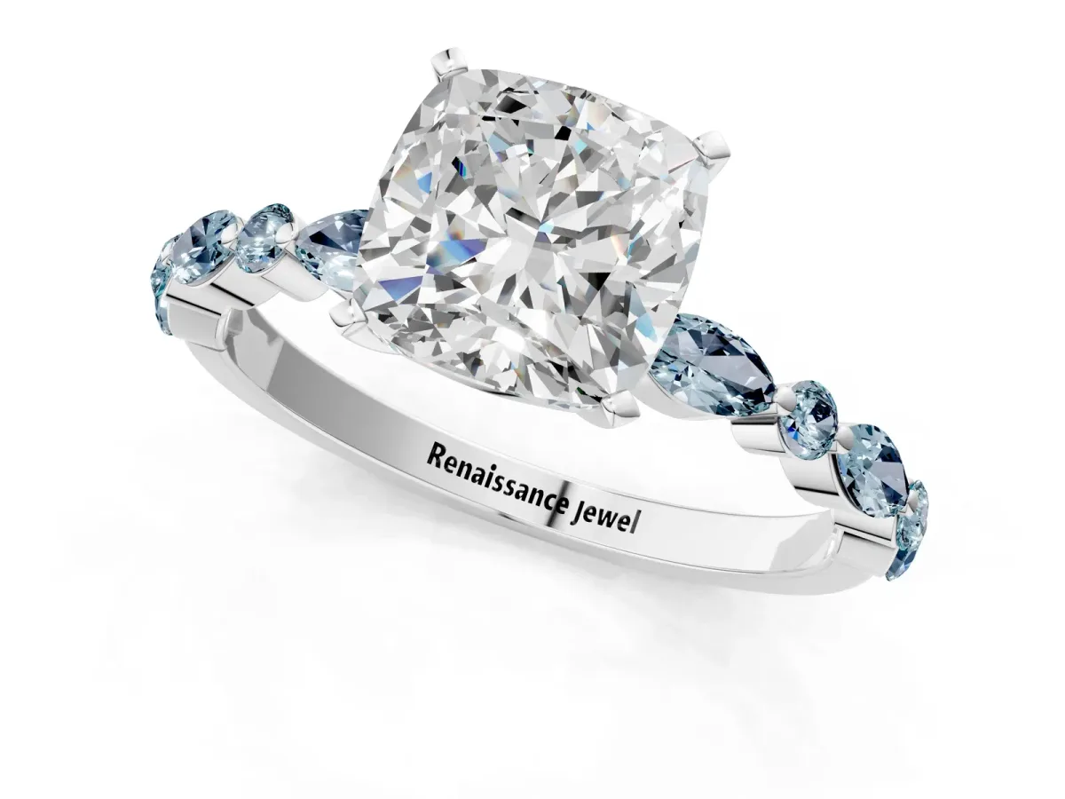 Cushion Cut Diamond Ring with Marquise and Round Aquamarine Side Stones and Four-Prong Setting Platinum