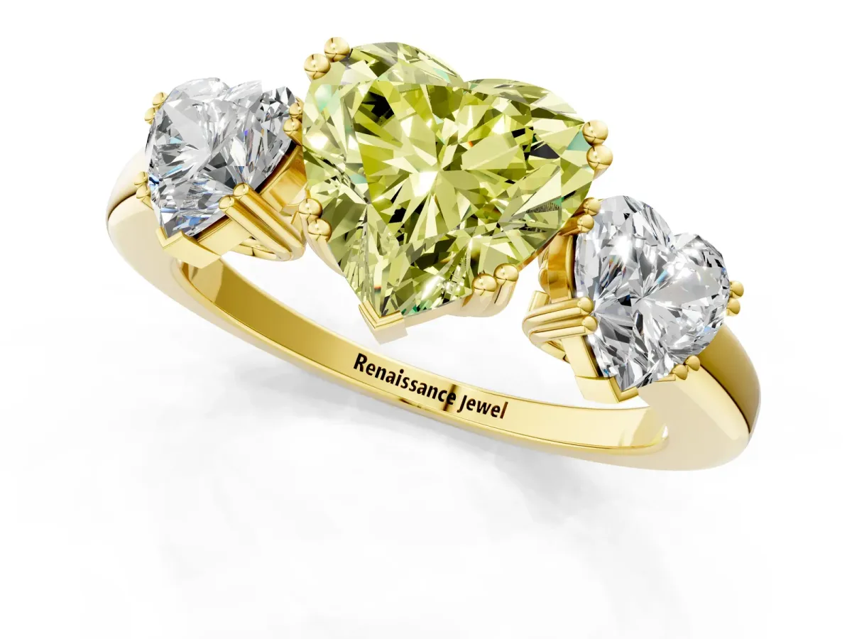Fancy Yellow Three-Stone Heart Cut Cut Diamond Ring with Channel Set Band and Four-Prong Setting Yellow gold