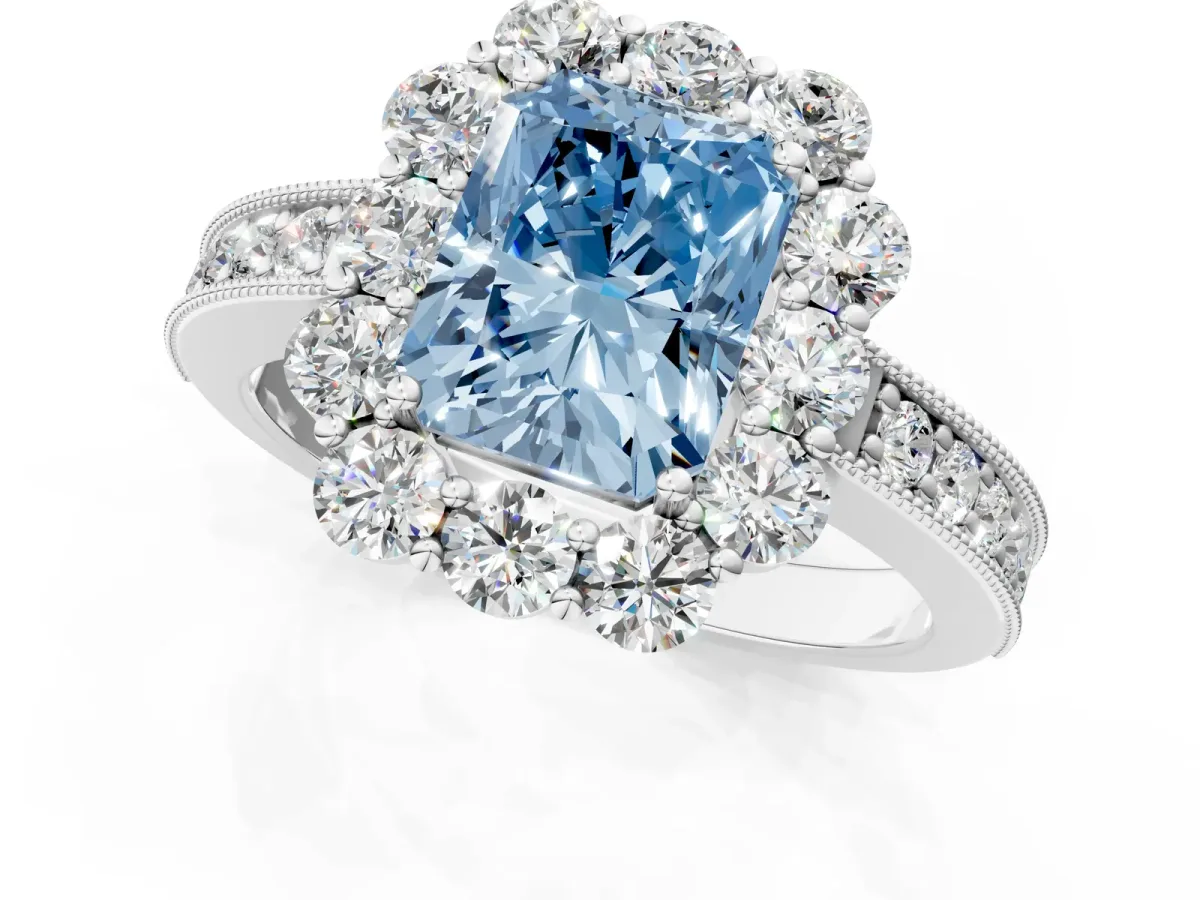 Fancy Blue Radiant Cut Cut Halo Diamond Pavé Engagement Ring with Milgrain Detailing Platinum