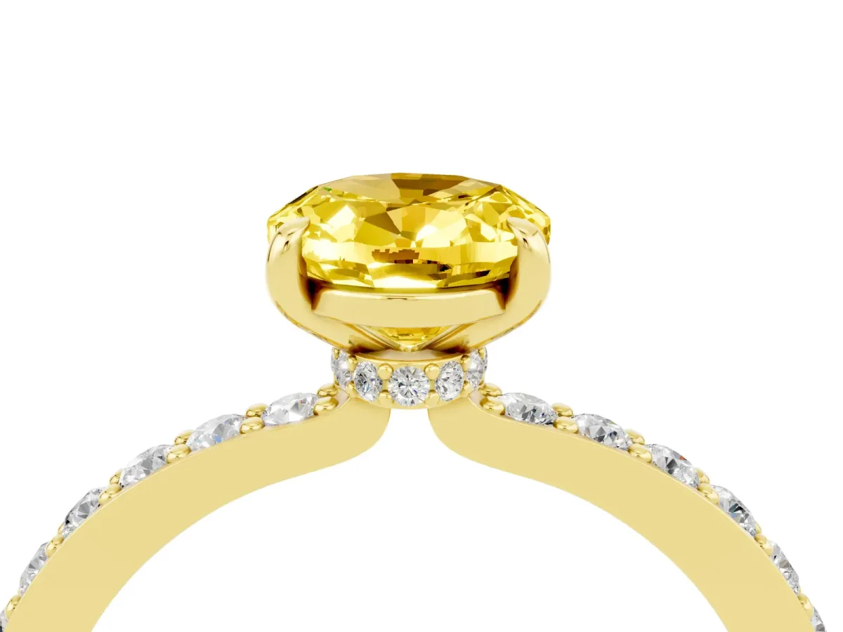 Oval Cut Yellow Sapphire Solitaire Engagement Ring with Pavé Band and Four-Prong Setting Yellow gold