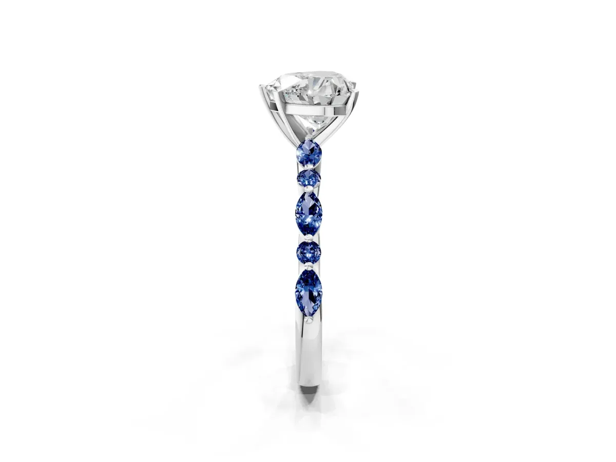Heart Cut Diamond Ring with Marquise and Round Blue Sapphire Side Stones and Four-Prong Setting White gold