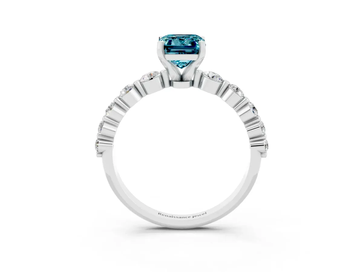 Emerald Cut Solitaire Blue Topaz Ring with Pave Band and Four-Prong Setting Platinum