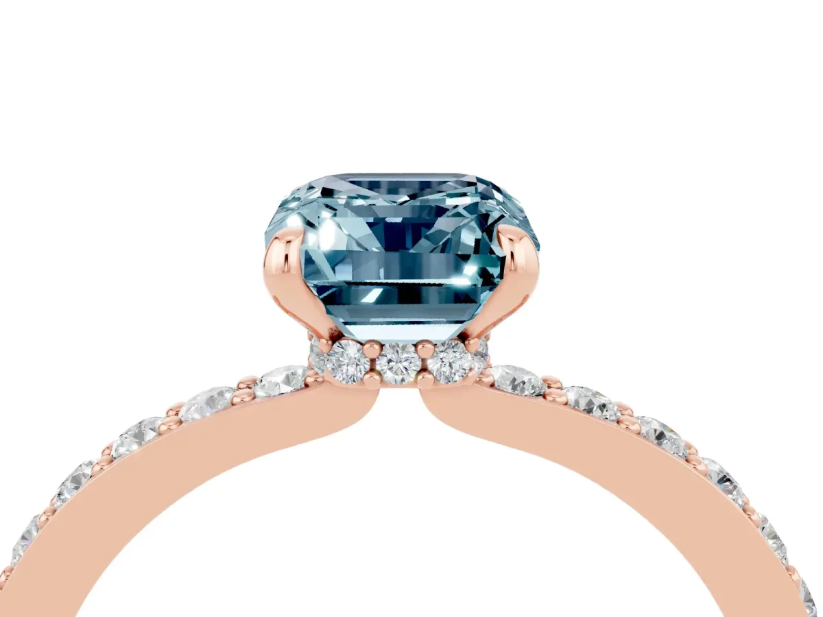 Emerald Cut Aquamarine Solitaire Engagement Ring with Pavé Band and Four-Prong Setting Rose gold