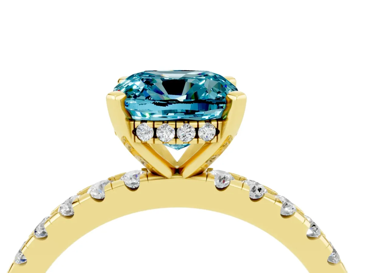 Cushion Cut Blue Topaz Solitaire Ring with Round Pavé Band and Four-Prong Setting Yellow gold