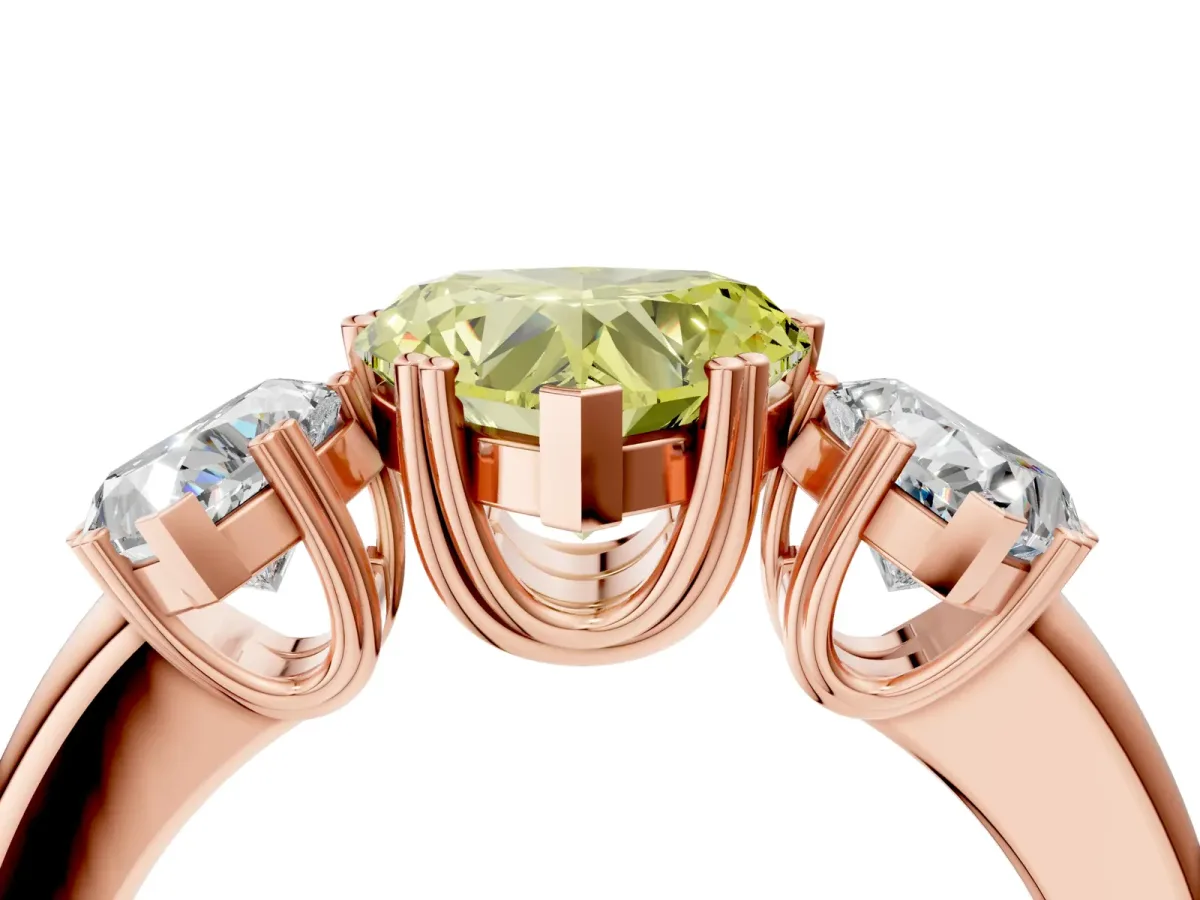 Fancy Yellow Three-Stone Heart Cut Cut Diamond Ring with Channel Set Band and Four-Prong Setting Rose gold
