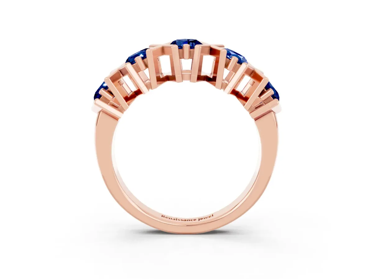 Round Blue Sapphire Channel Set Band with X-Prong Detail Rose gold