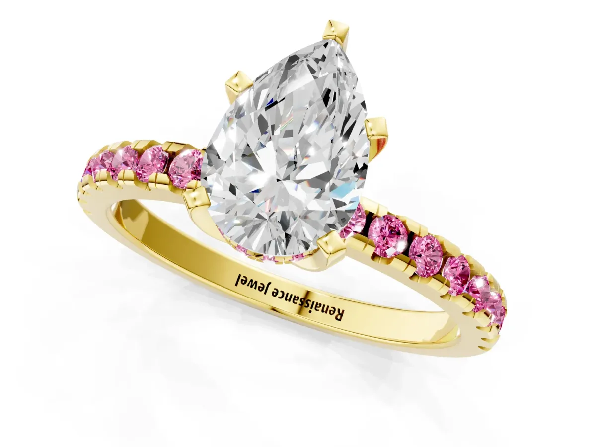Pear Cut Diamond Solitaire Ring with Round Pink Sapphire Pavé Band and Four-Prong Setting Yellow gold