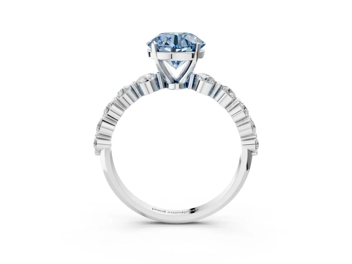 Fancy Blue Round Cut Solitaire Diamond Ring with Pave Band and Four-Prong Setting Silver