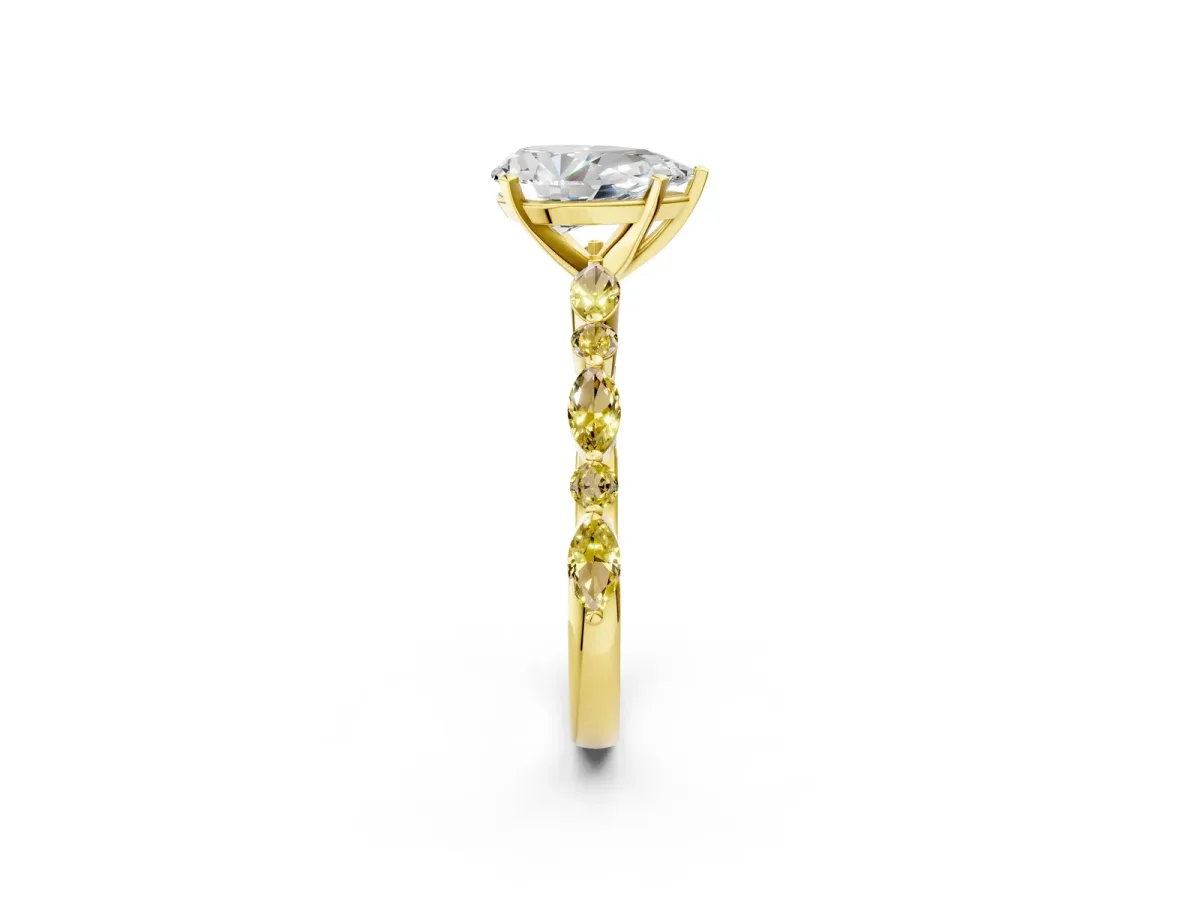 Pear Cut Diamond Ring with Marquise and Round Yellow Sapphire Side Stones and Four-Prong Setting Yellow gold