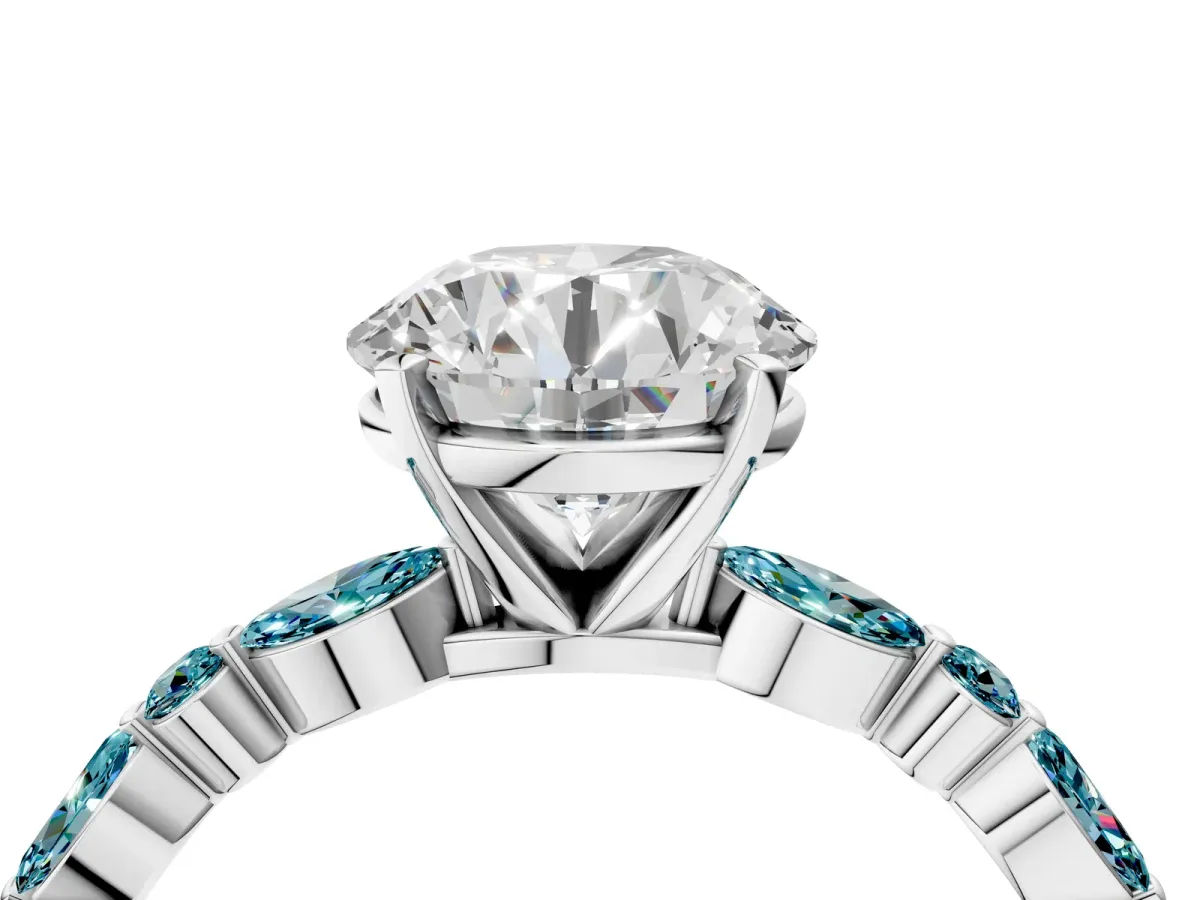 Round Cut Diamond Ring with Marquise and Round Blue Topaz Side Stones and Four-Prong Setting White gold