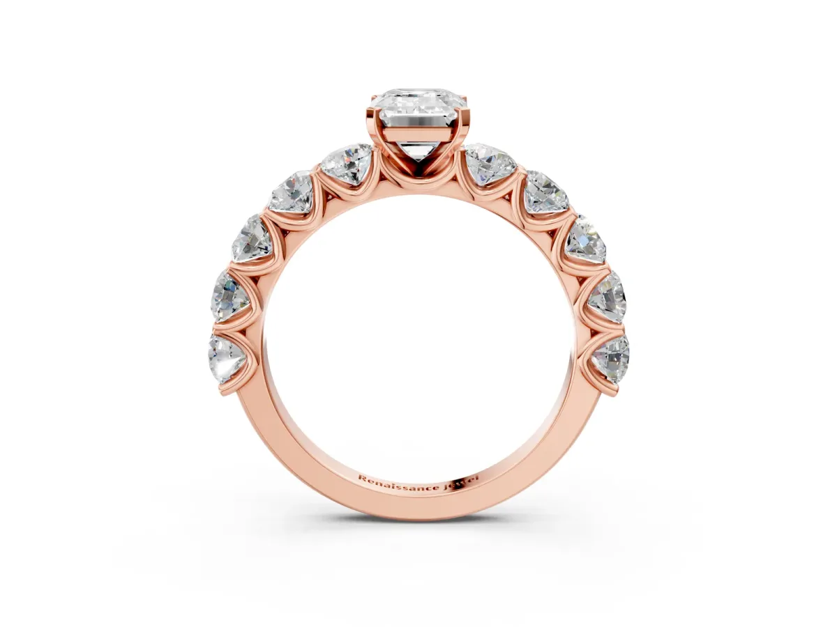 Emerald Cut Diamond Prong Setting with Side Stones on a Pave Band Rose gold