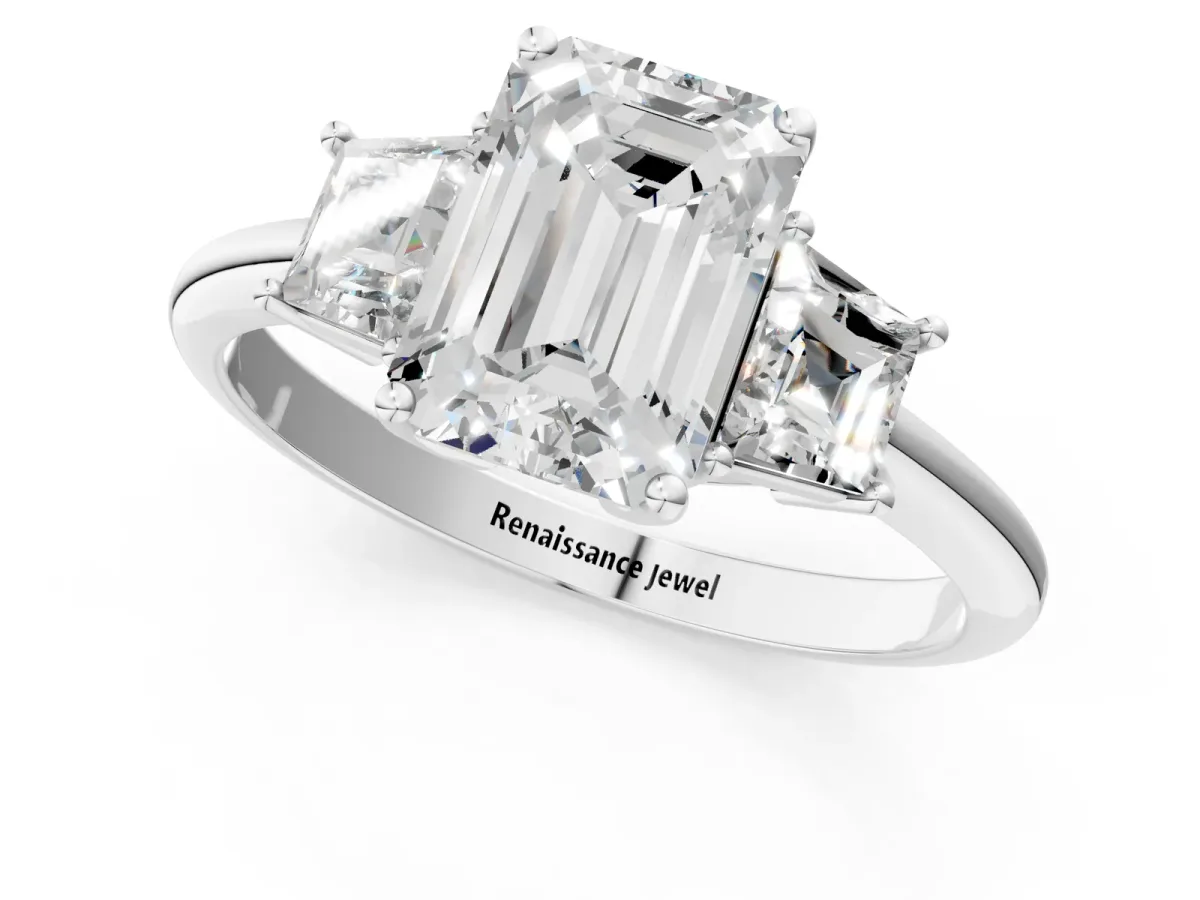 Emerald Cut Diamond Three-Stone Ring with Trapezoid Side Stones and Prong Setting Silver