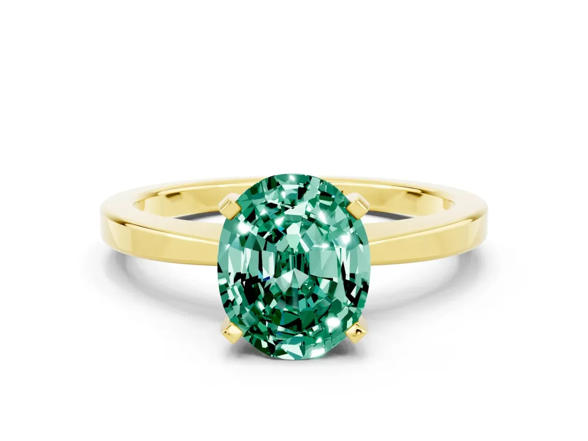 Oval Cut Green Sapphire Solitaire Engagement Ring with Classic Band and Four-Prong Setting Yellow gold