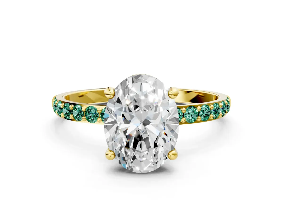Oval Cut Diamond Solitaire Ring with Round Green Sapphire Pavé Band and Prong Setting Yellow gold