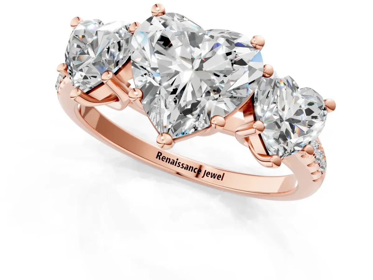 Three-Stone Heart Cut Diamond Ring with Round Moissanite Pavé Band and Prong Setting Rose gold