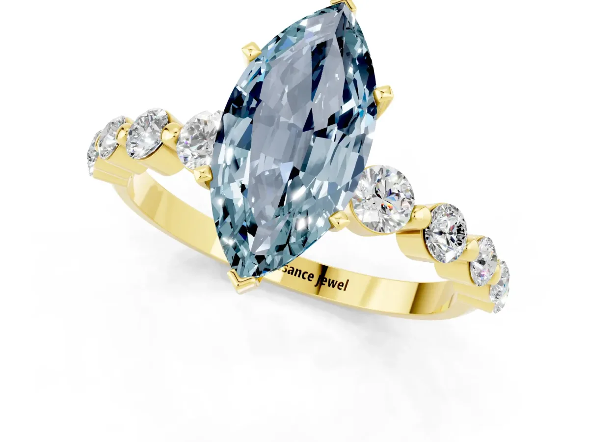Marquise Cut Solitaire Aquamarine Ring with Pave Band and Four-Prong Setting Yellow gold