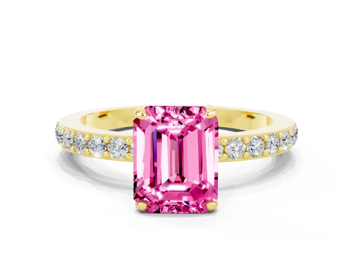 Emerald Cut Pink Sapphire Solitaire Engagement Ring with Pavé Band and Four-Prong Setting Yellow gold