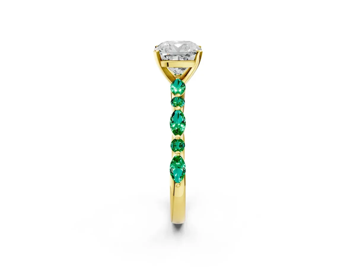 Cushion Cut Diamond Ring with Marquise and Round Emerald Side Stones and Four-Prong Setting Yellow gold