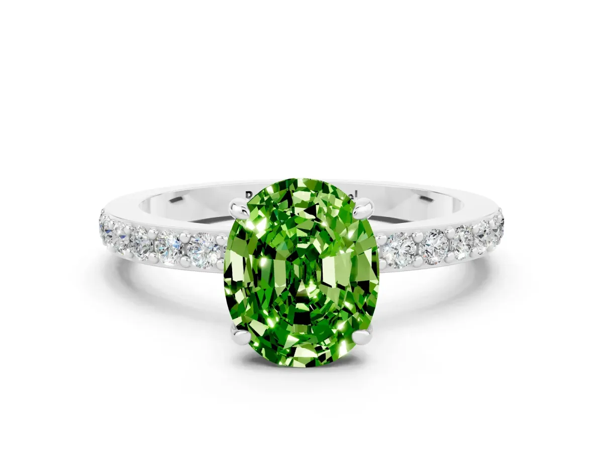 Oval Cut Peridot Solitaire Engagement Ring with Pavé Band and Four-Prong Setting Silver