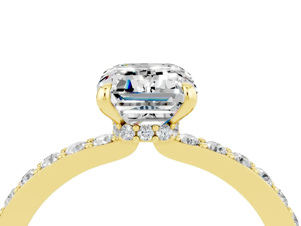 Emerald Cut Moissanite Solitaire Engagement Ring with Pavé Band and Four-Prong Setting Yellow gold