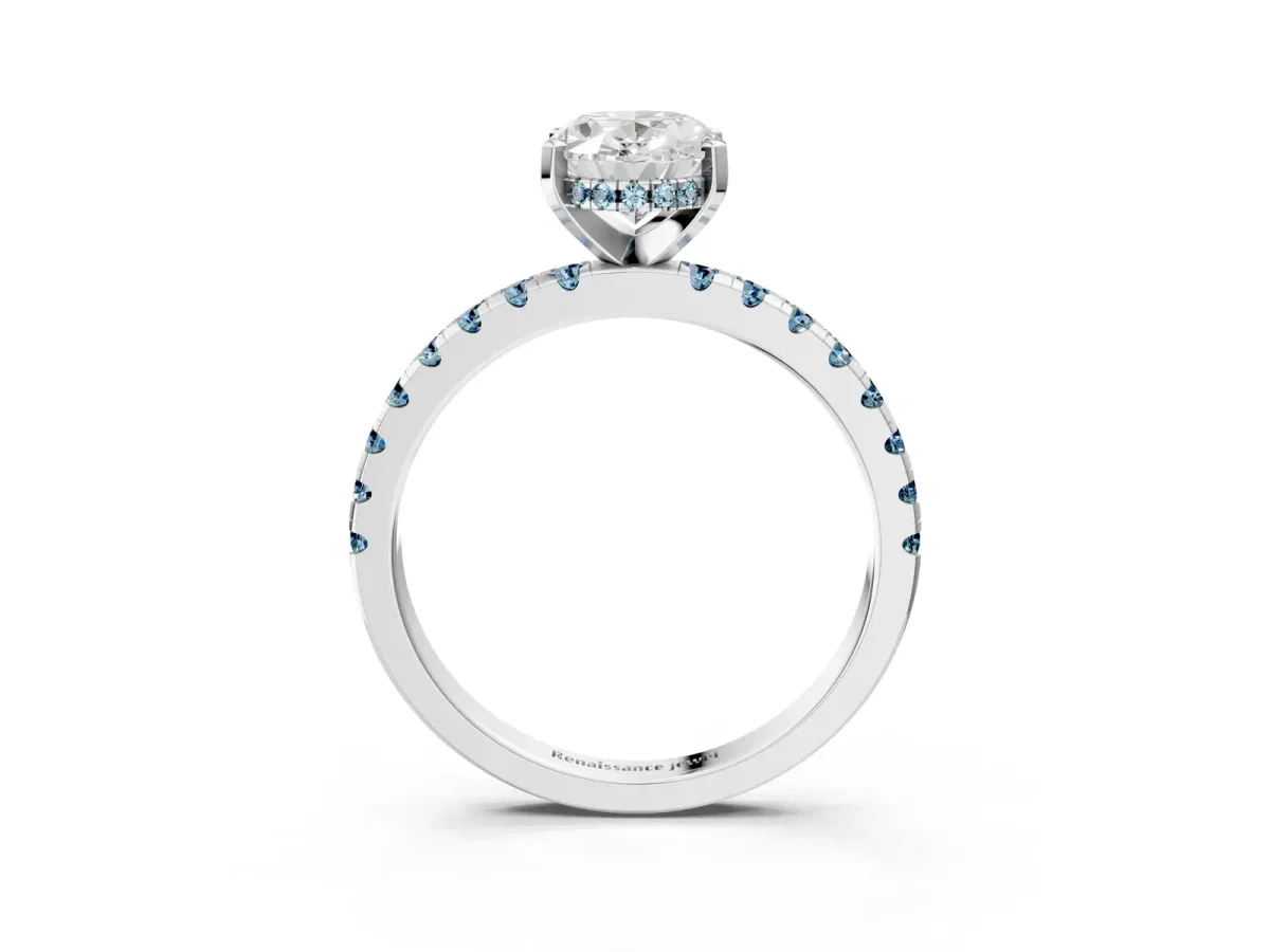Oval Cut Diamond Solitaire Ring with Round Aquamarine Pavé Band and Four-Prong Setting White gold