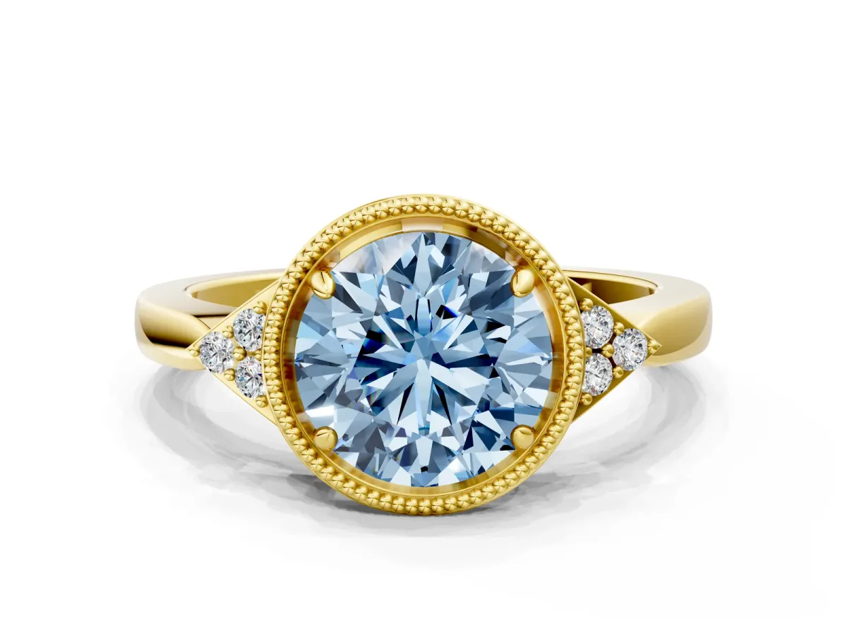 Fancy Blue Milgrain Round Cut Cut Diamond Ring with Tapered Pave Band and Four Prong Setting Yellow gold