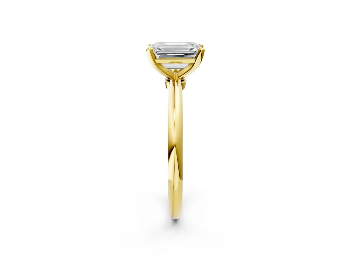 Emerald Cut Diamond Solitaire Ring with Six-Prong Setting and Classic Band Yellow gold