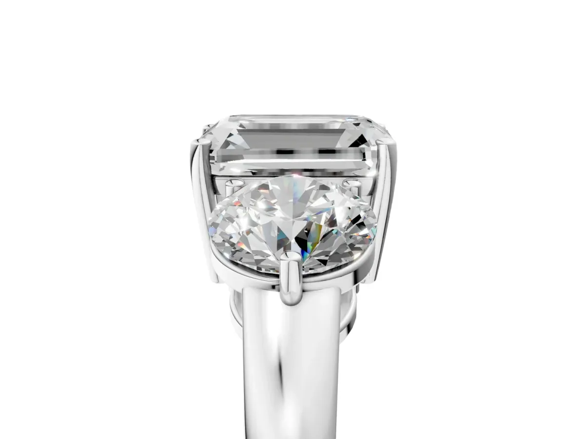 Emerald Cut Diamond Three-Stone Ring with Prong Setting and Classic Band White gold