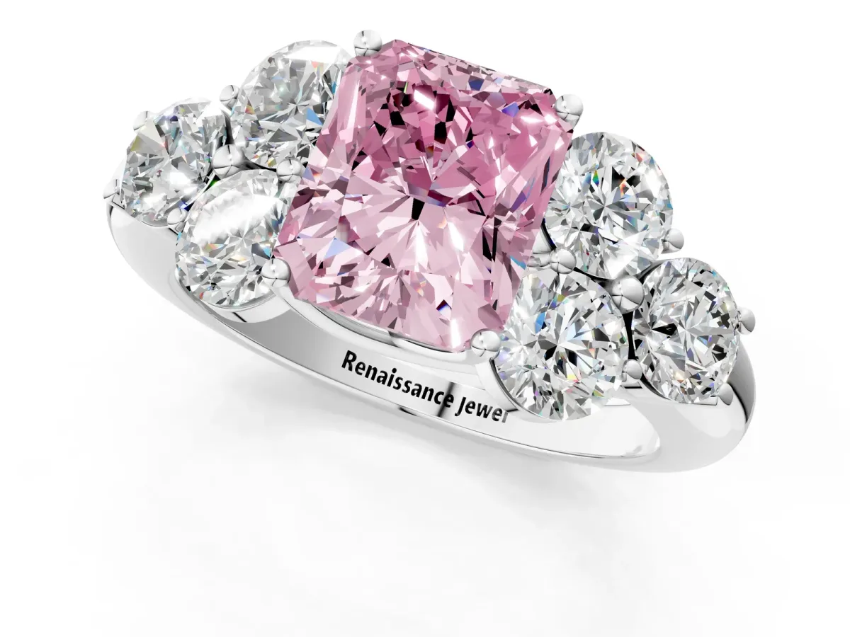 Fancy Pink Radiant Cut Cut Diamond Cluster Ring with Round Accent Stones and Prong Setting on a Classic Band Platinum