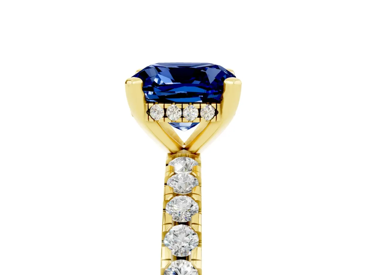 Cushion Cut Blue Sapphire Solitaire Ring with Round Pavé Band and Four-Prong Setting Yellow gold