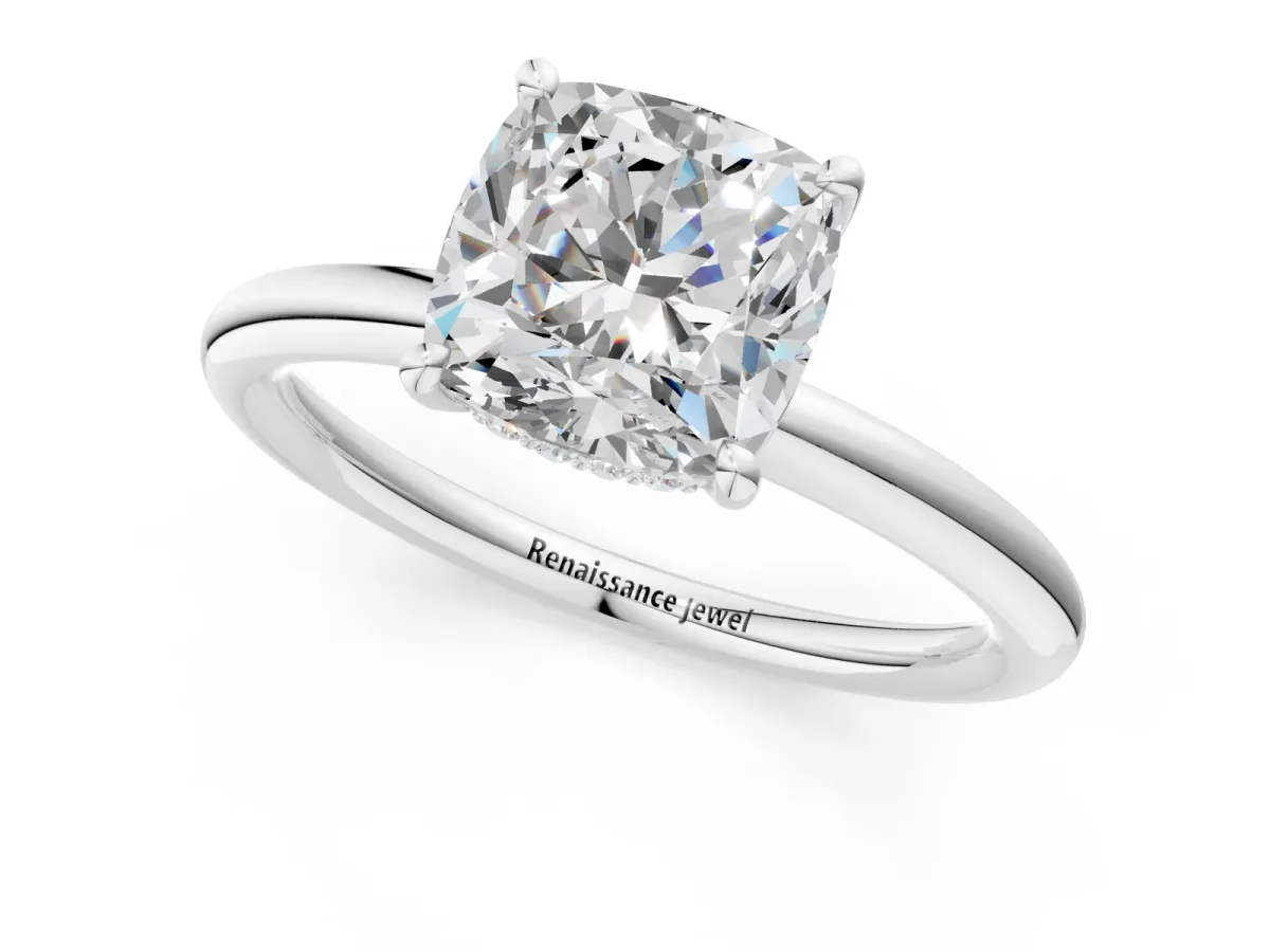 Cushion Cut Diamond Solitaire Ring with Thin Band and Four-Prong Setting White gold