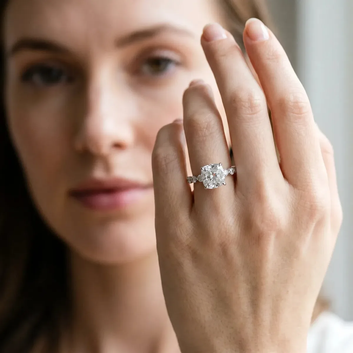 Cushion Cut Solitaire Diamond Ring with Pave Band and Four-Prong Setting Platinum