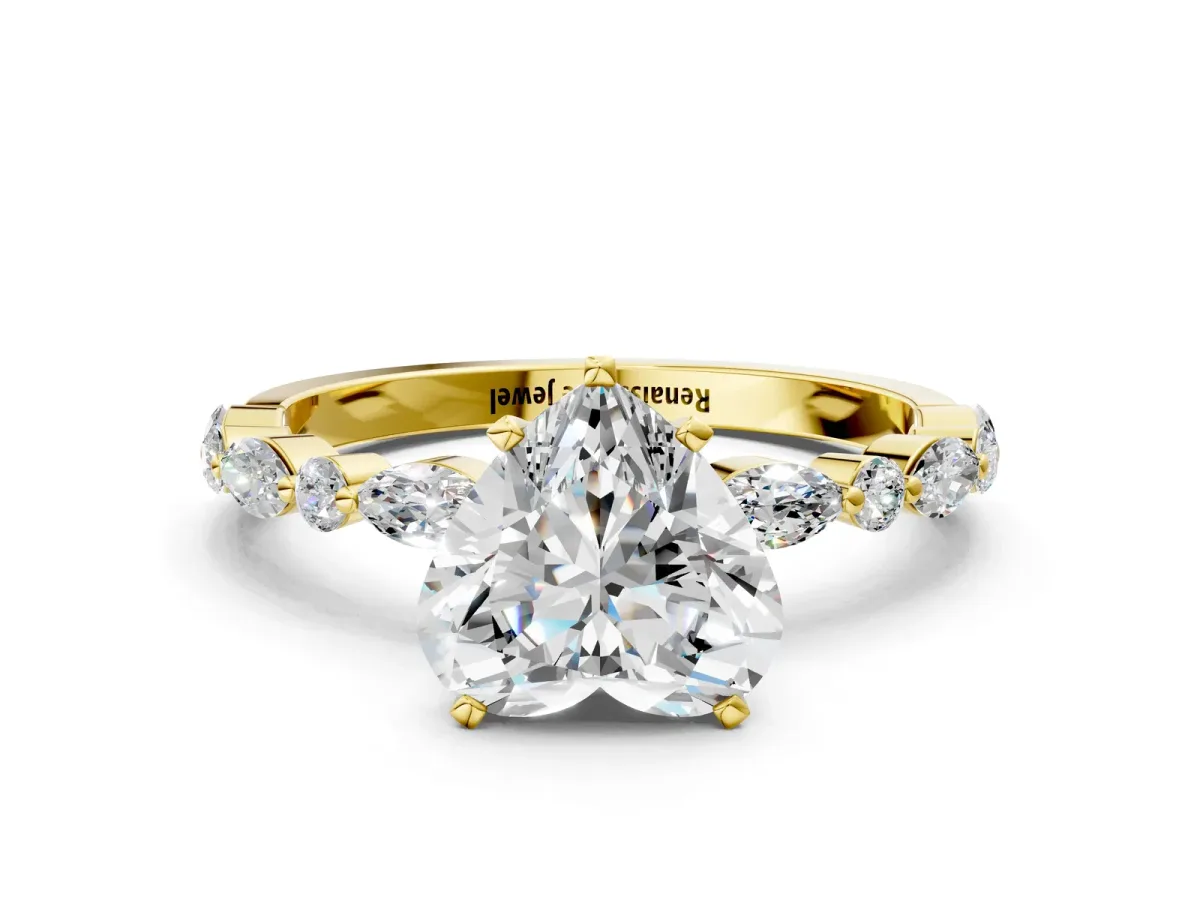 Heart Cut Diamond Ring with Marquise and Round Side Stones and Four-Prong Setting Yellow gold