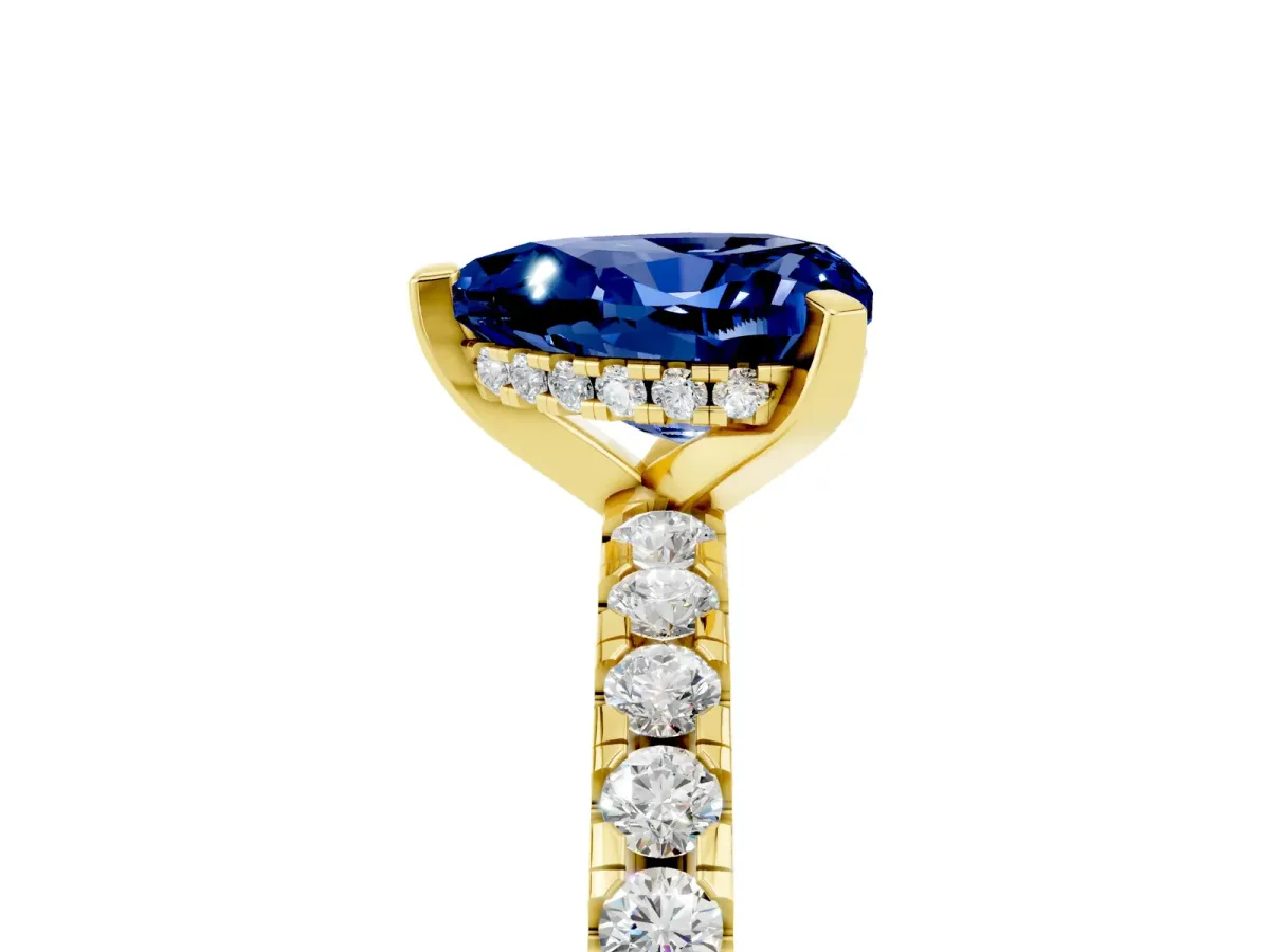 Heart Cut Blue Sapphire Solitaire Ring with Round Pavé Band and Four-Prong Setting Yellow gold