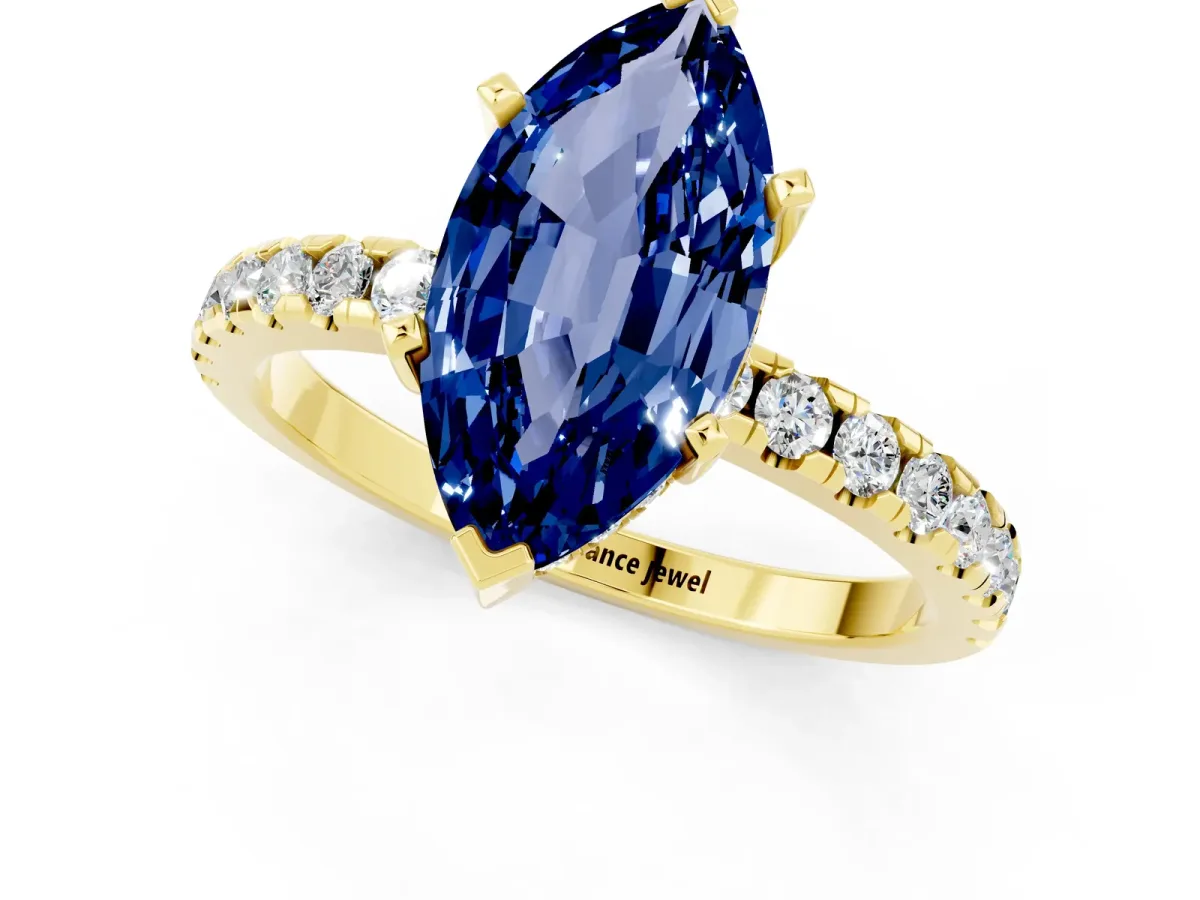 Marquise Cut Blue Sapphire Solitaire Ring with Round Pavé Band and Four-Prong Setting Yellow gold