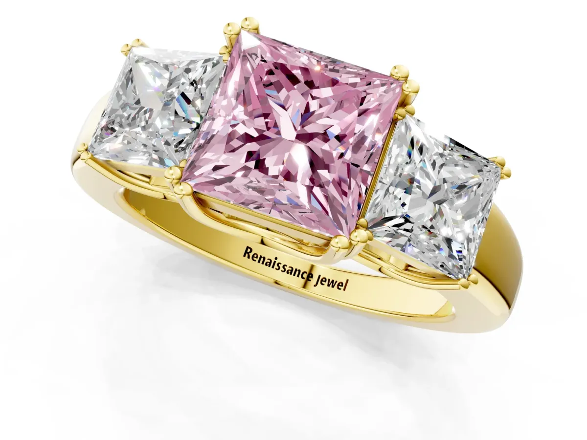 Fancy Pink Three-Stone Princess Cut Cut Diamond Ring with Channel Set Band and Four-Prong Setting Yellow gold