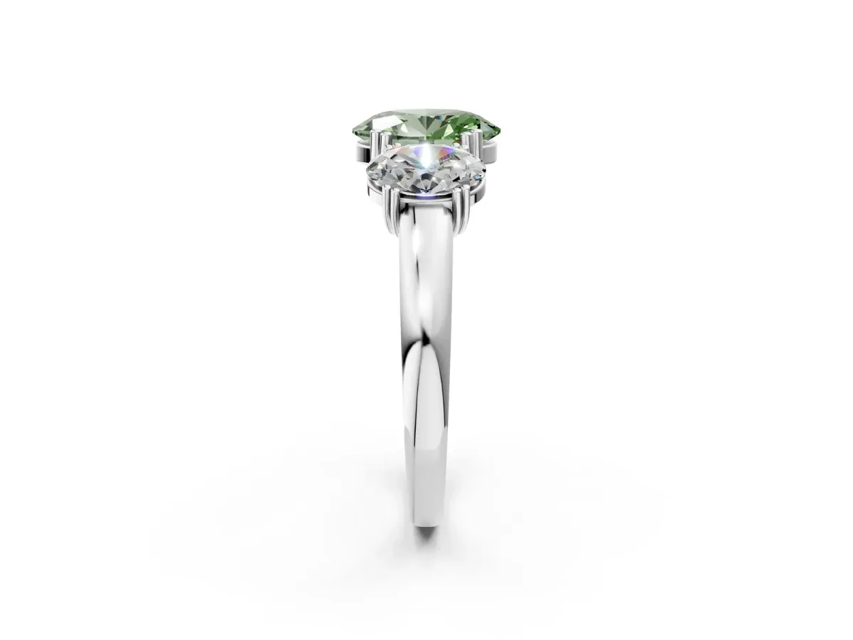 Fancy Green Three-Stone Oval Cut Cut Diamond Ring with Channel Set Band and Four-Prong Setting Silver