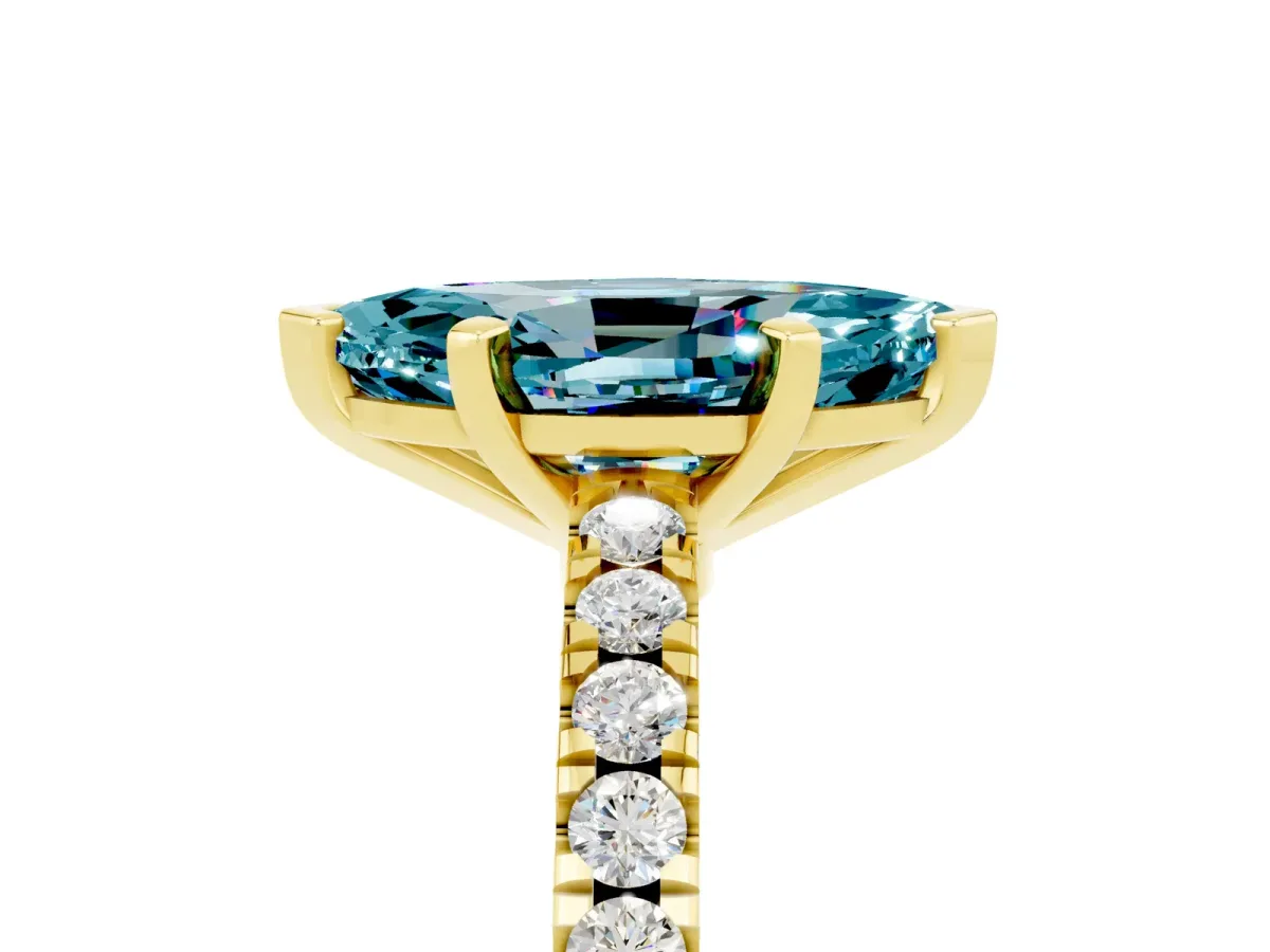 Marquise Cut Solitaire Blue Topaz with Pavé Band and Four-Prong Setting Yellow gold