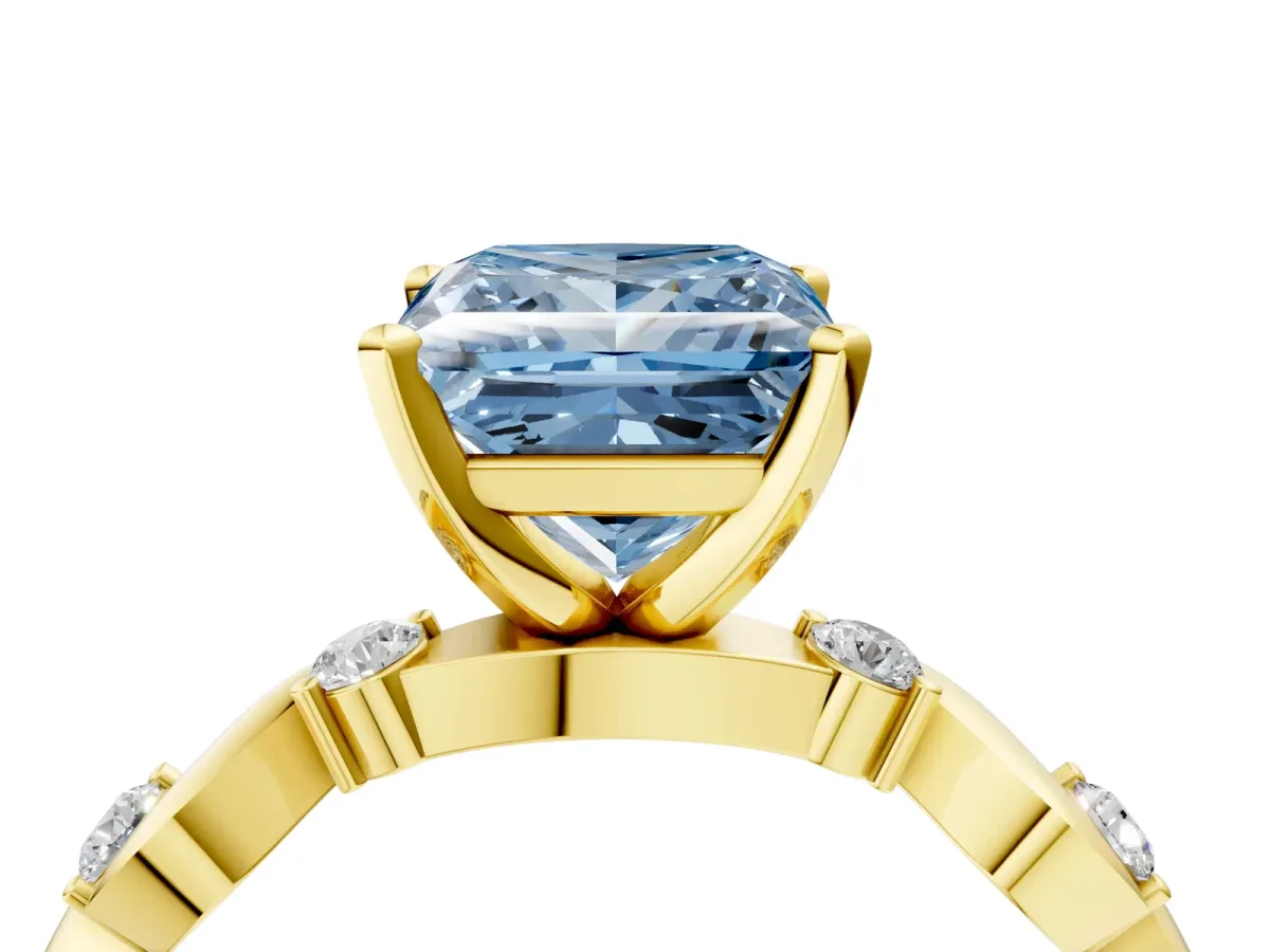 Fancy Blue Princess Cut Diamond Solitaire Twisted Band with Round Accents and Prong Setting Yellow gold