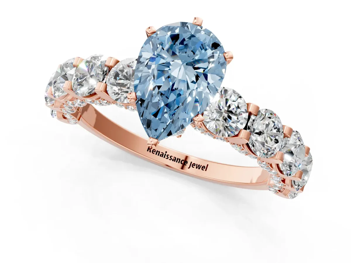 Fancy Blue Pear Cut Diamond Side Stone Engagement Ring with Four-Prong Setting Rose gold
