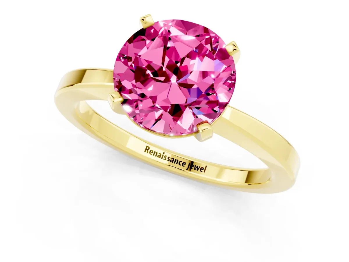 Round Cut Pink Sapphire Solitaire Engagement Ring with Classic Band and Four-Prong Setting Yellow gold