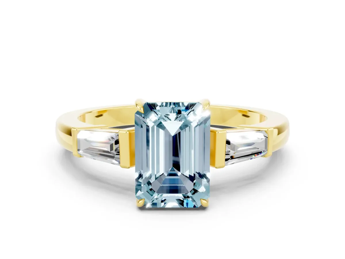 Emerald Cut Aquamarine Three-Stone Ring with Tapered Baguette Side Stones and Prong Setting Yellow gold